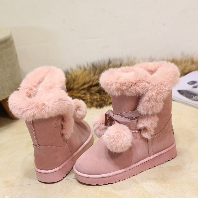 Pelzige rosa Winterstiefel