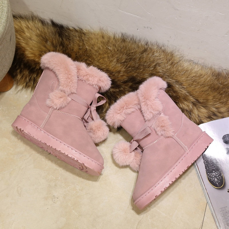 Pelzige rosa Winterstiefel