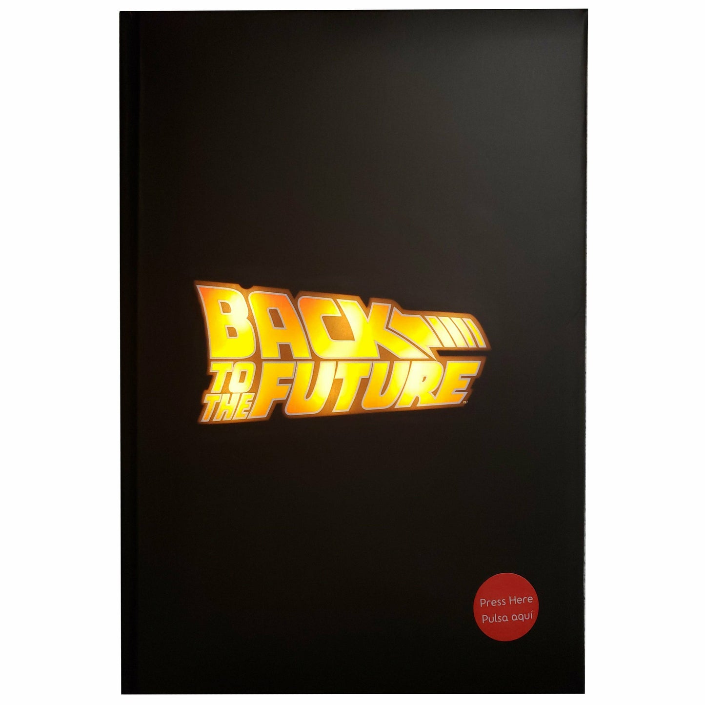 „Zurück in die Zukunft“-Tagebuch mit leuchtendem „BTTF-Logo“.