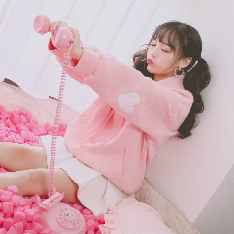 Kapuzenpullover mit Herzärmeln