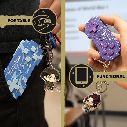 Blue Levi controller keychain clipped to clothing and purple Hange controller held in one hand