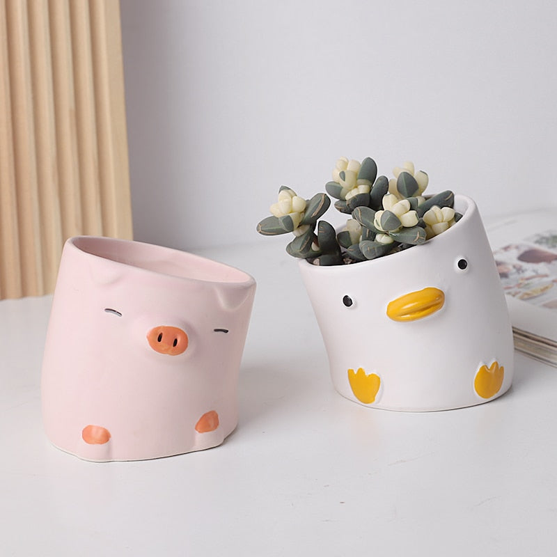 Crooked Duck and Pig Planters