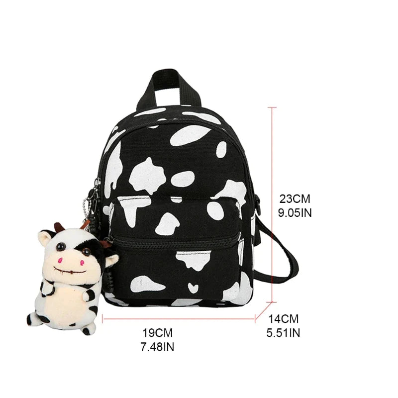 cow print mini backpack Mini Canvas Daypack With Plush Cow Pendant Cow Print Backpack Adorable Backpack For Women Lady Girls Outdoor Travel Shopping (white)(1pcs)