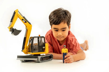 CATERPILLAR Mini Excavator with worker