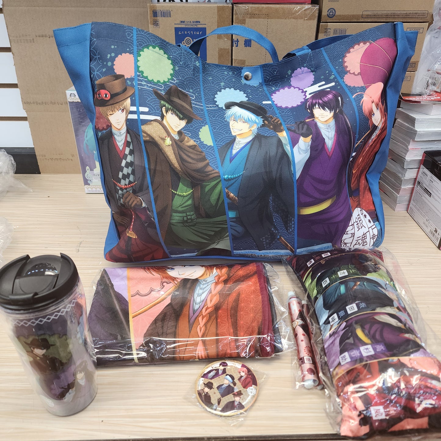 Gintama Goodie Bag Includes 1 Tumbler, 1 Small Pillow, 1 Button, 1 Small Wallscroll, 1 Blanket